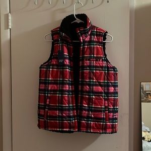 Pink plaid vest, size small, fluffy black inside, brand new with tags